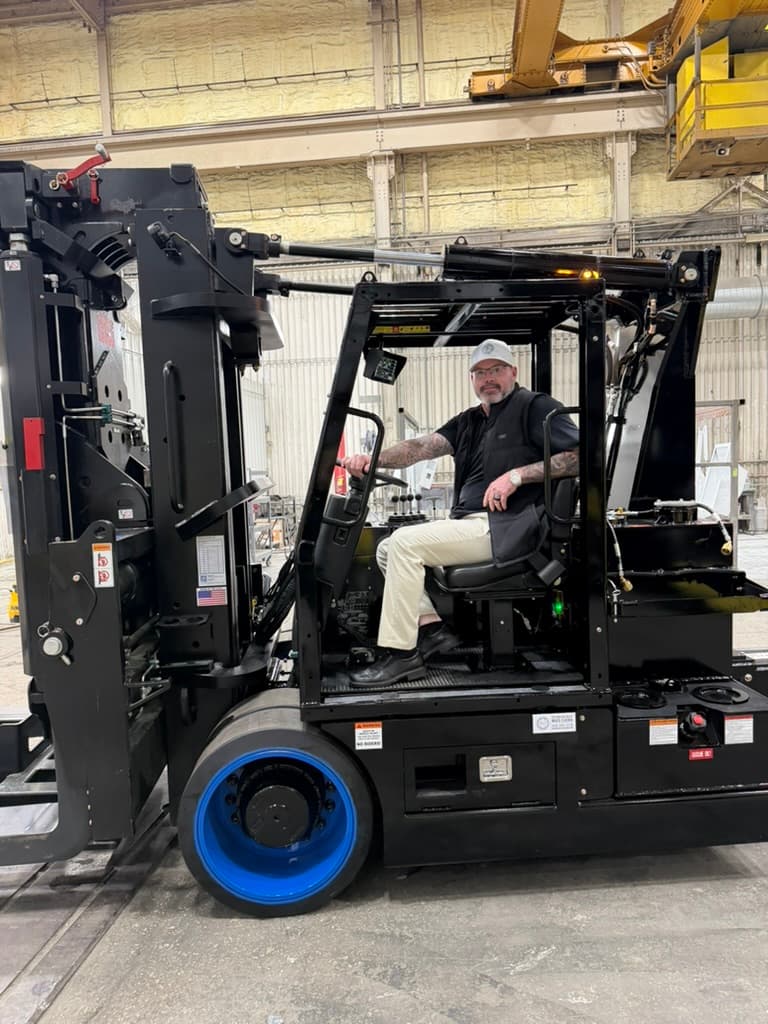 IMM crew moving industrial equipment safely on-site