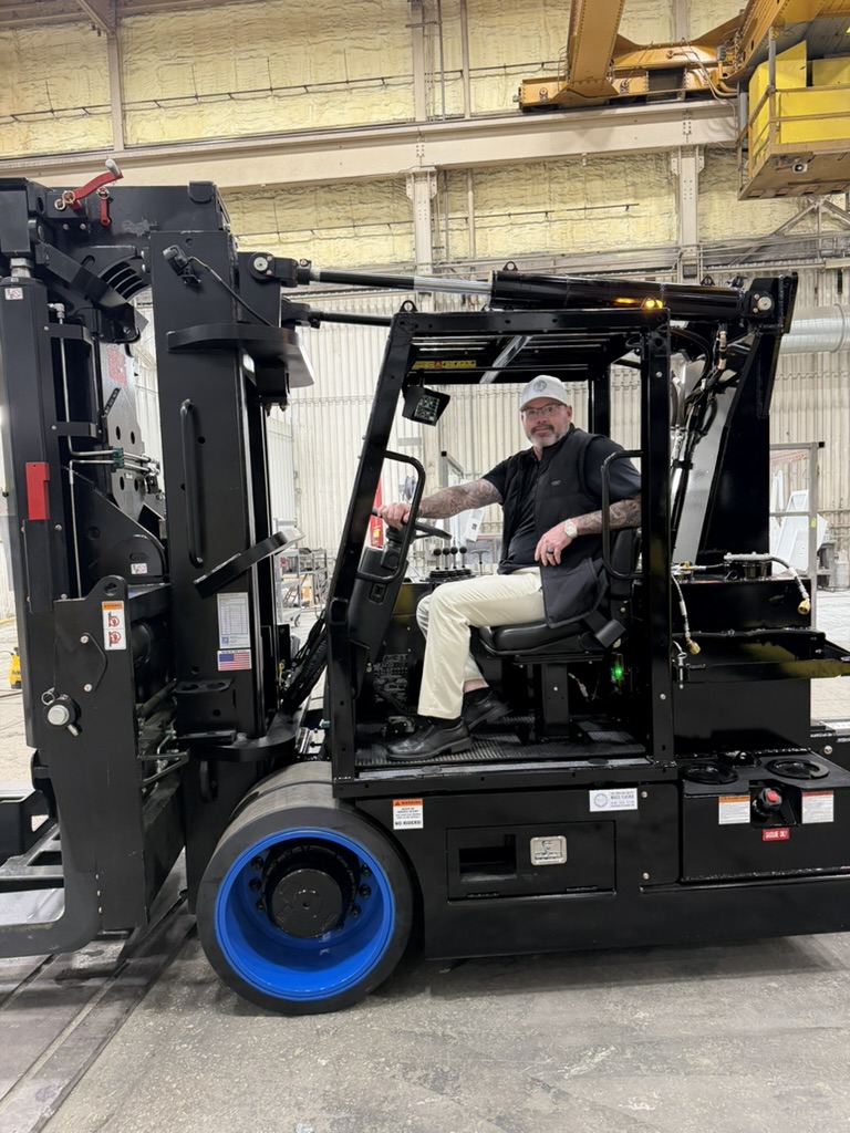 IMM crew moving industrial equipment safely on-site